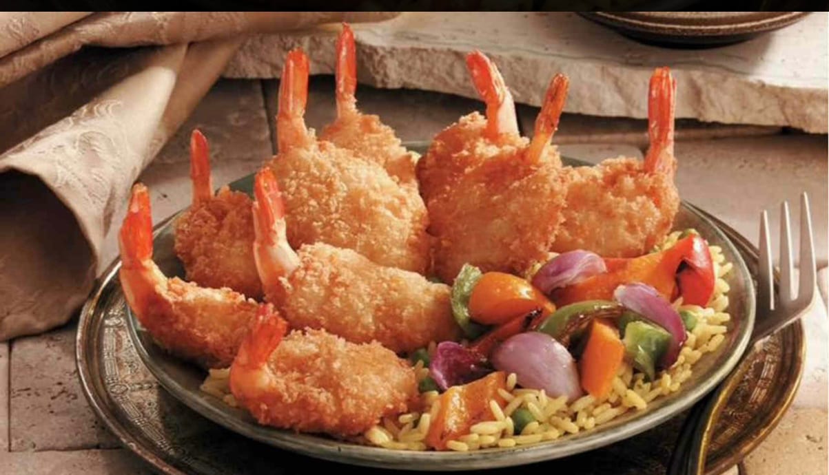 6 Piece Jumbo Shrimp Over Rice.